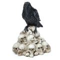 Crow Standing on Pile of Skulls Ornament-