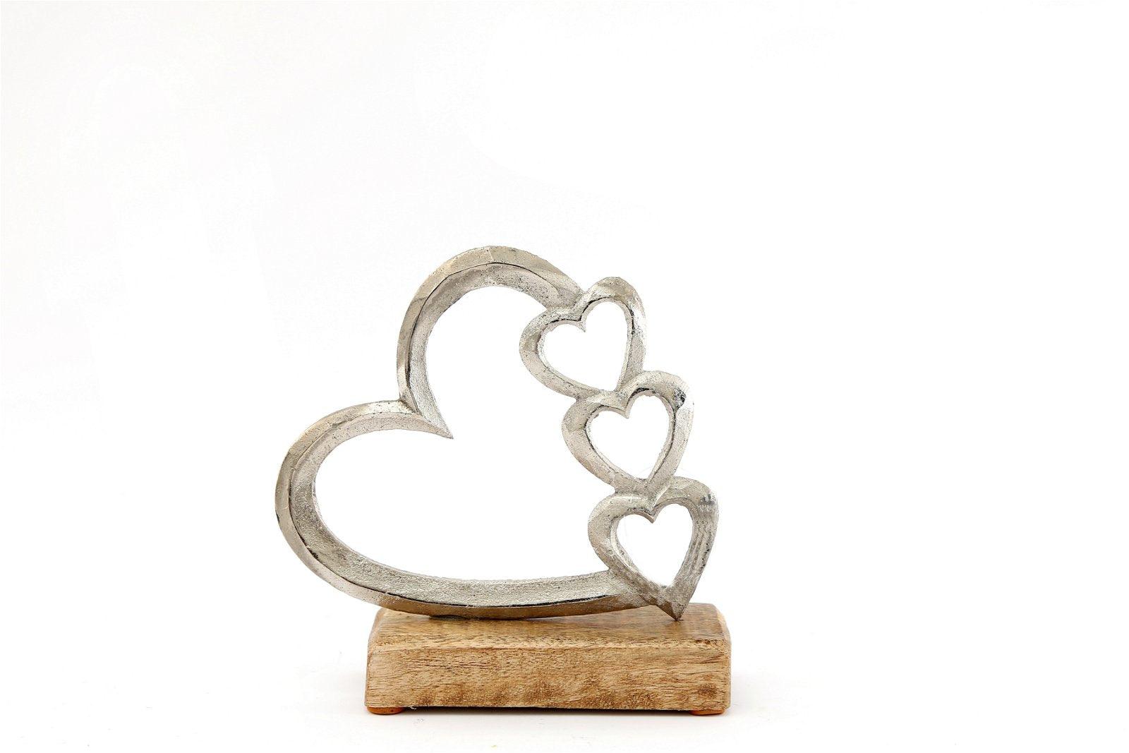 Metal Silver Four Heart Ornament On A Wooden Base Small-